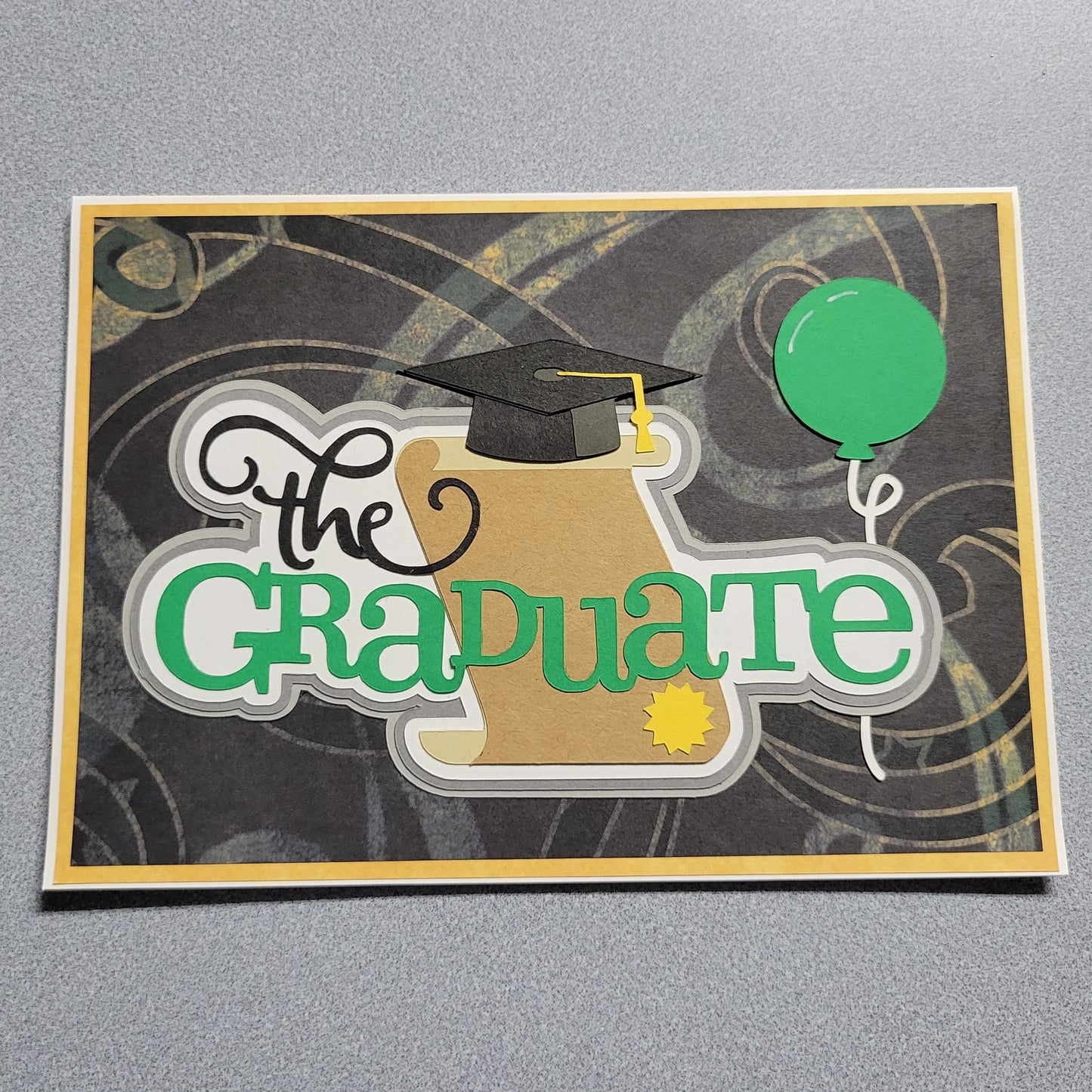 The Graduate Card green.
