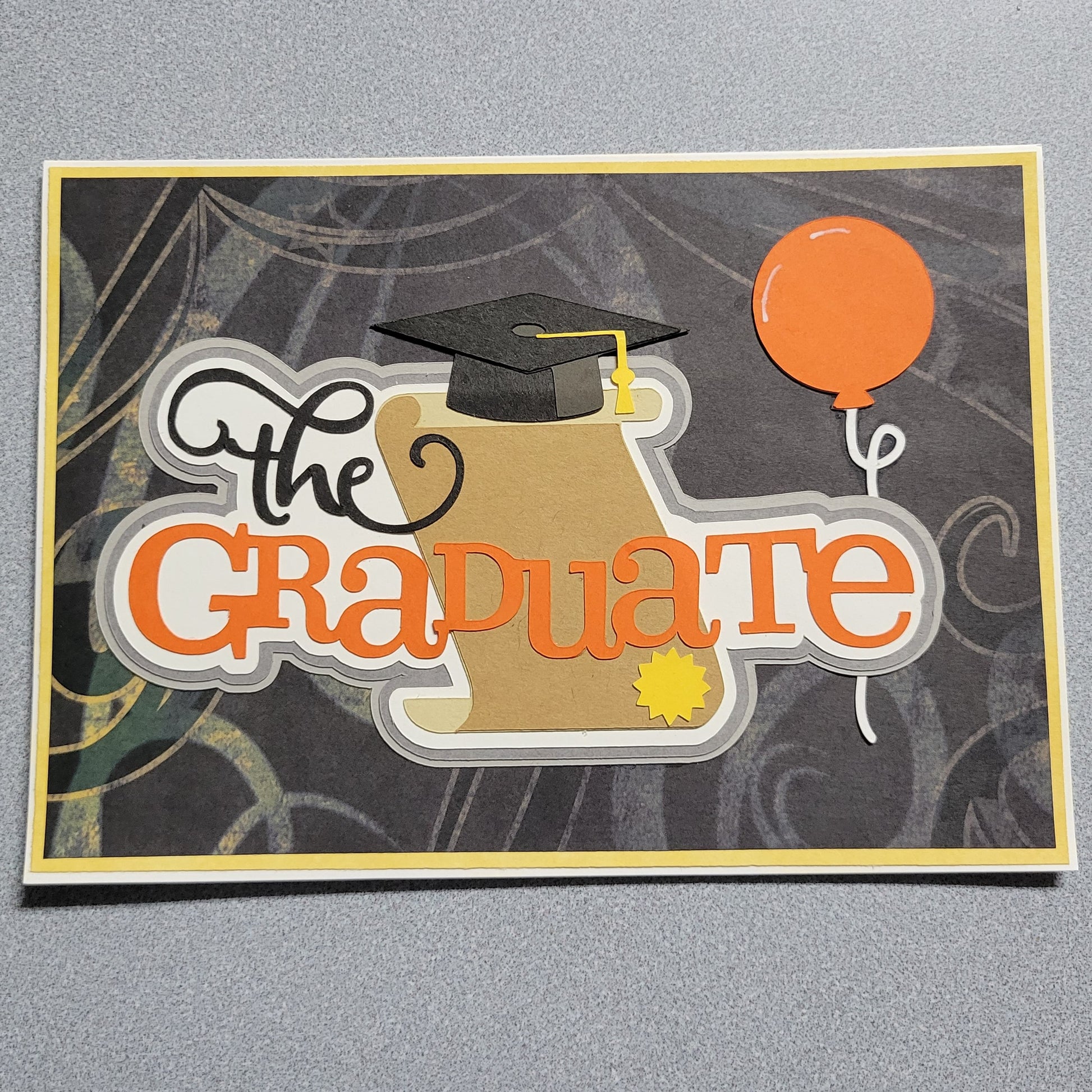 The Graduate Card orange.